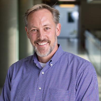 Portrait image of Michael Thelan in hallway